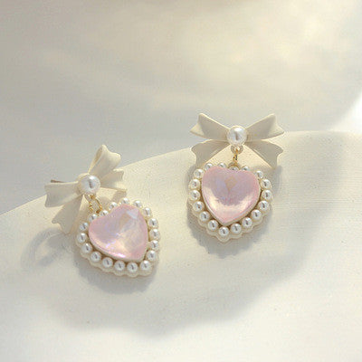 Love bow pearl ear decoration HA1093