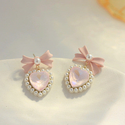 Love bow pearl ear decoration HA1093
