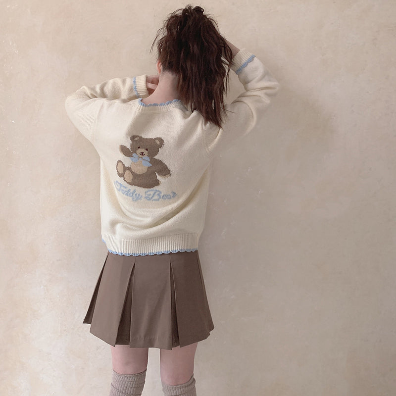 Beige knitted sweater with blue bow  HA0422